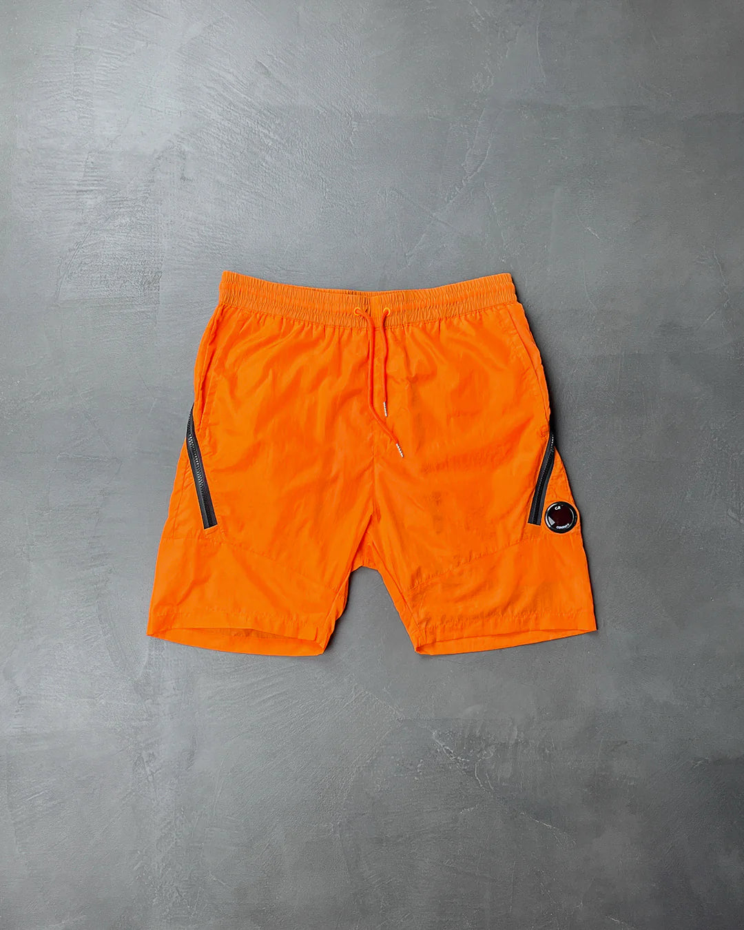 C.P. COMPANY Chrome Lens Pocket Shorts Orange