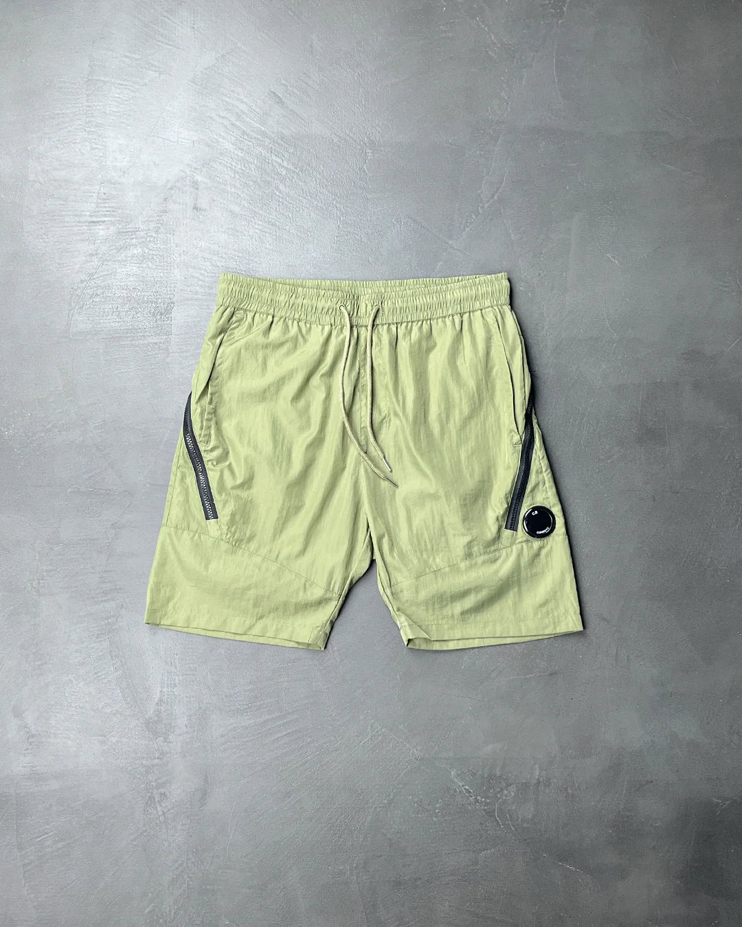 C.P. COMPANY Chrome Lens Pocket Shorts Olive