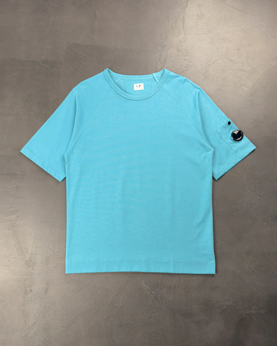 C.P. COMPANY Arm Lens Raglan T-Shirt Lake Blue